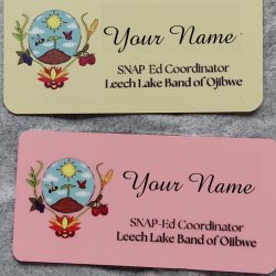 Two name badges display a colorful emblem, job title "SNAP-Ed Coordinator," and "Leech Lake Band of Ojibwe.