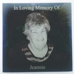 Black and white memorial image of a smiling woman with text: "In Loving Memory Of Jeannie.